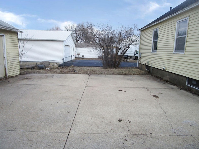 view of patio featuring a garage