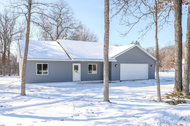 single story home with a garage