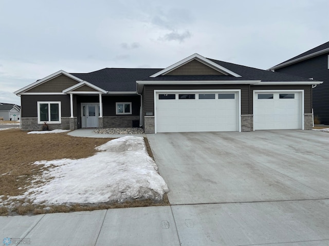 ranch-style home featuring a garage