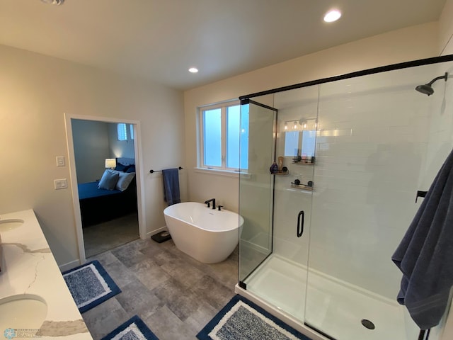 bathroom with vanity and plus walk in shower