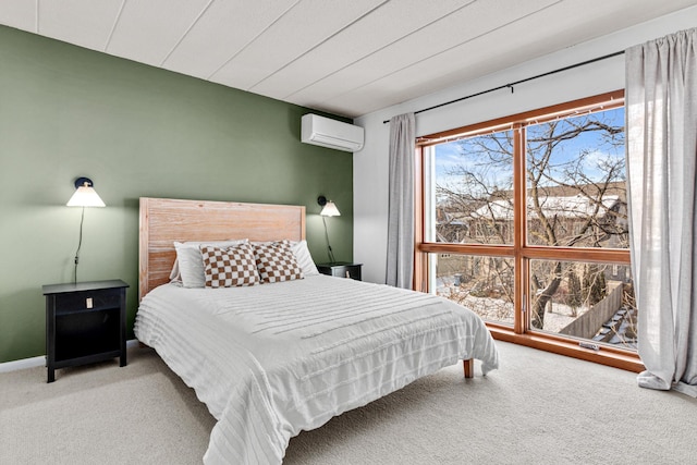 carpeted bedroom with a wall mounted air conditioner