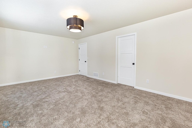 5476 Lori Ln W, West Fargo, ND 58078 - carpeted empty room featuring baseboards