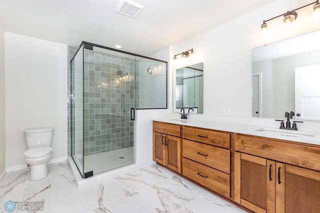 5476 Lori Ln W, West Fargo, ND 58078 - bathroom with double vanity, a shower stall, toilet, marble finish floors, and baseboards