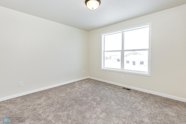 5476 Lori Ln W, West Fargo, ND 58078 - carpeted empty room with baseboards