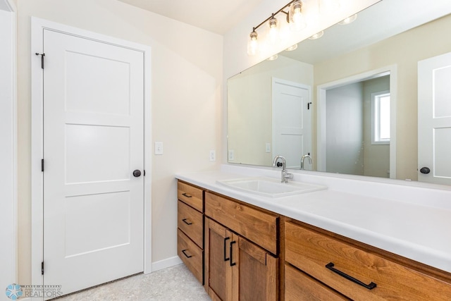 5476 Lori Ln W, West Fargo, ND 58078 - bathroom featuring vanity and baseboards