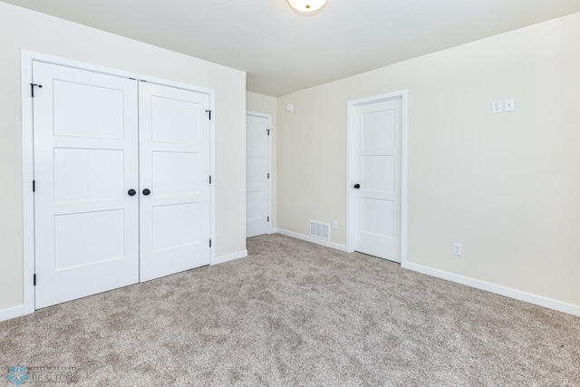 5476 Lori Ln W, West Fargo, ND 58078 - unfurnished bedroom with carpet, baseboards, and a closet