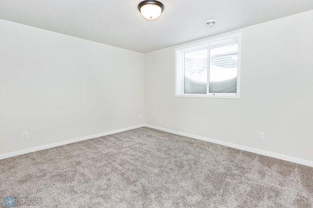 5476 Lori Ln W, West Fargo, ND 58078 - carpeted spare room with baseboards and a smoke detector