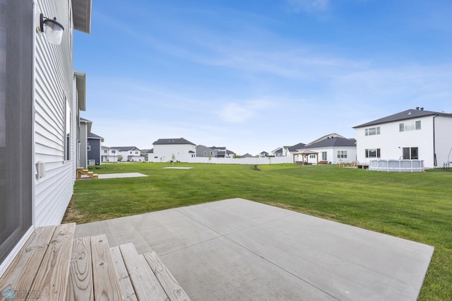 5476 Lori Ln W, West Fargo, ND 58078 - view of grassy yard with a residential view, a patio, and a pool