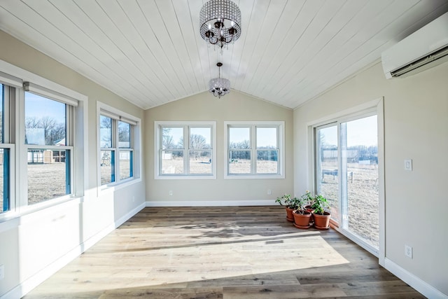 unfurnished sunroom featuring lofted ceiling, an inviting chandelier, wood ceiling, and a wall mounted air conditioner