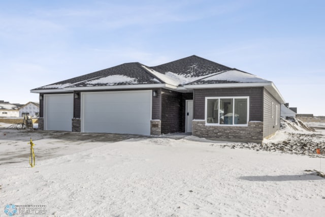 view of front of home with a garage