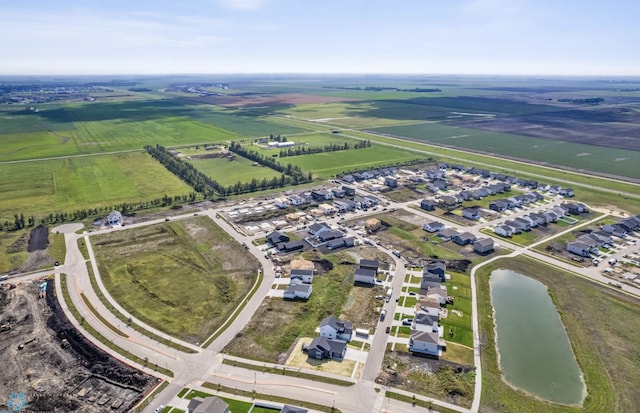 bird's eye view with a rural view and a water view