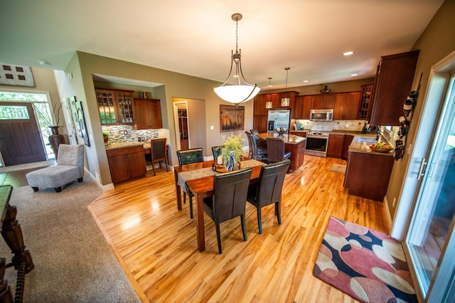 2441 Rosewood Ln SW, Rochester, MN 55902 - dining space featuring light wood-type flooring and recessed lighting