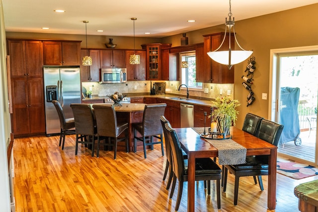2441 Rosewood Ln SW, Rochester, MN 55902 - dining area with light wood-style flooring and recessed lighting