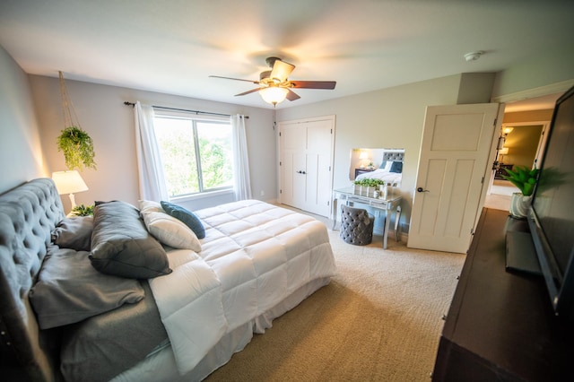 2441 Rosewood Ln SW, Rochester, MN 55902 - bedroom with light carpet, a closet, and ceiling fan