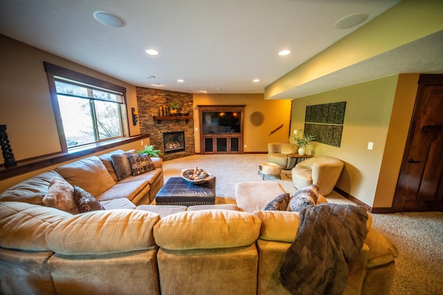 2441 Rosewood Ln SW, Rochester, MN 55902 - carpeted living room featuring baseboards, recessed lighting, and a stone fireplace