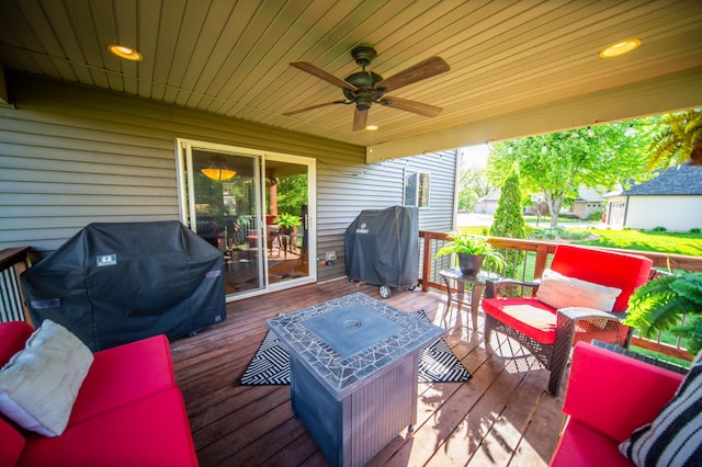 2441 Rosewood Ln SW, Rochester, MN 55902 - deck with ceiling fan, area for grilling, and outdoor lounge area
