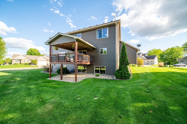 2441 Rosewood Ln SW, Rochester, MN 55902 - back of house featuring a lawn and a wooden deck