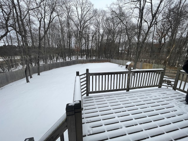 view of snow covered deck