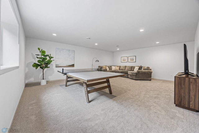 recreation room with carpet floors and recessed lighting
