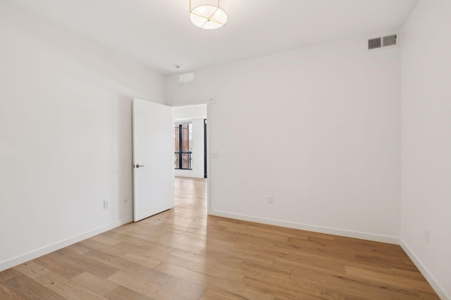 empty room with light wood-type flooring