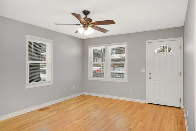 foyer featuring ceiling fan and light hardwood / wood-style flooring