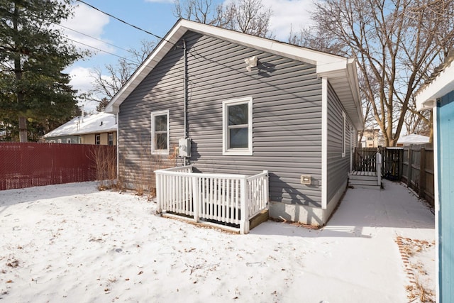 view of snow covered property