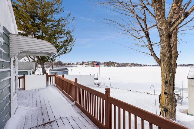 view of snow covered deck