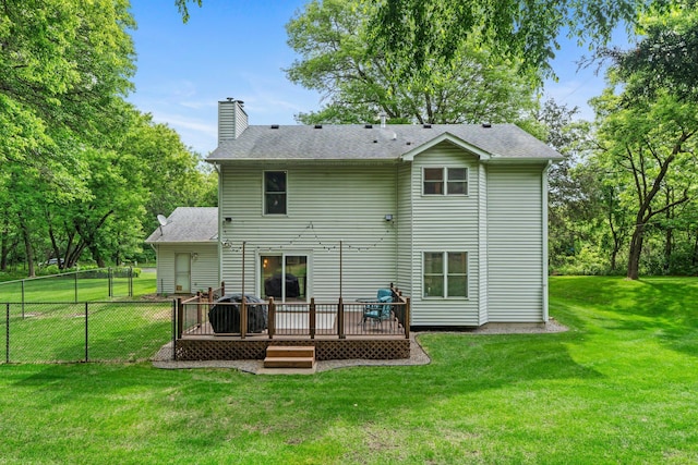 17130 Uplander Cir NW, Andover, MN 55304 - back of property with a deck, a chimney, and a shingled roof