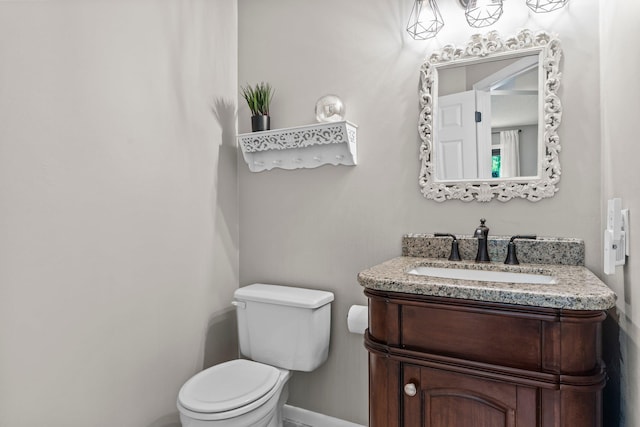 17130 Uplander Cir NW, Andover, MN 55304 - half bath with toilet, vanity, and baseboards