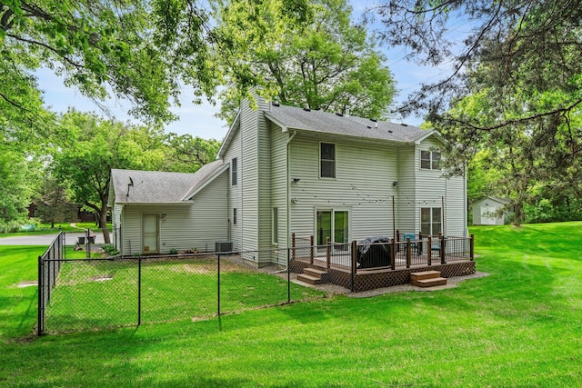 17130 Uplander Cir NW, Andover, MN 55304 - rear view of property featuring a deck, a chimney, and a shingled roof
