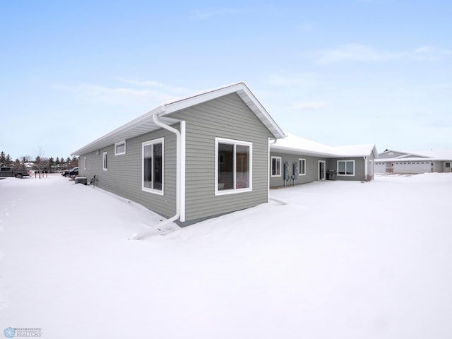 view of snow covered property