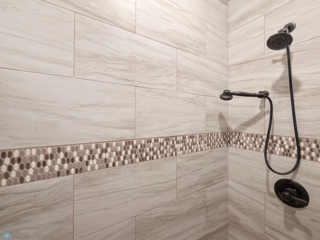 details with a tile shower