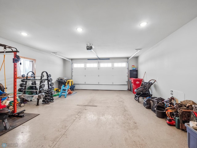 garage featuring a garage door opener