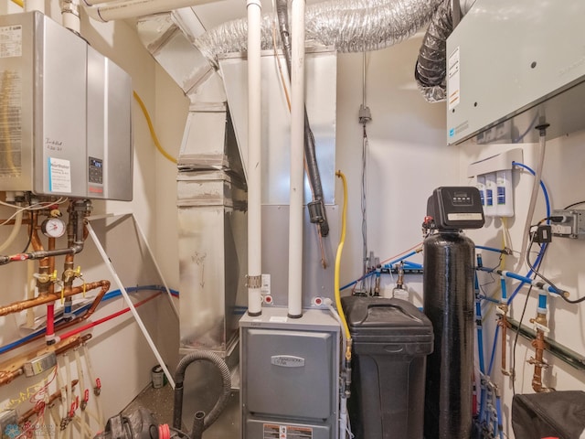 utility room with tankless water heater