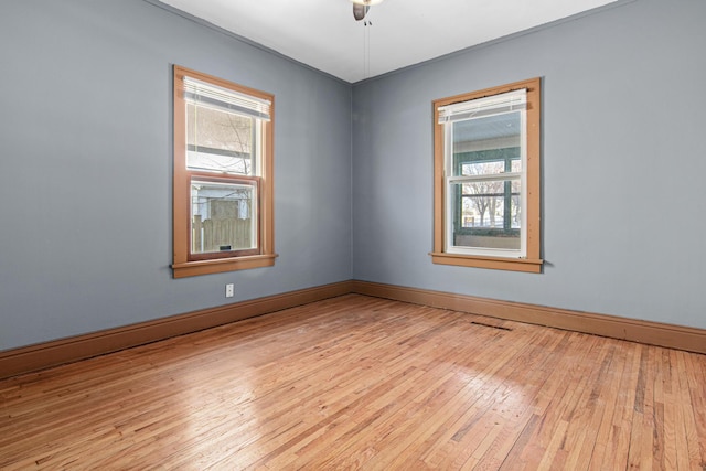 unfurnished room featuring light hardwood / wood-style floors