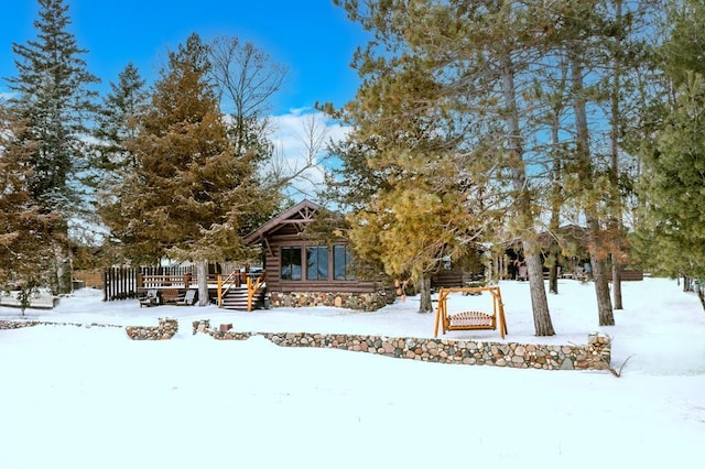 view of log cabin