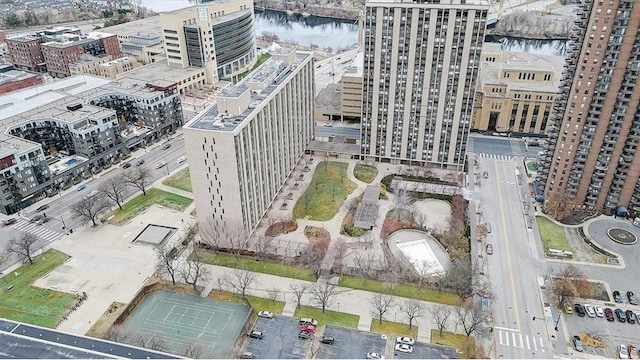 birds eye view of property with a water view