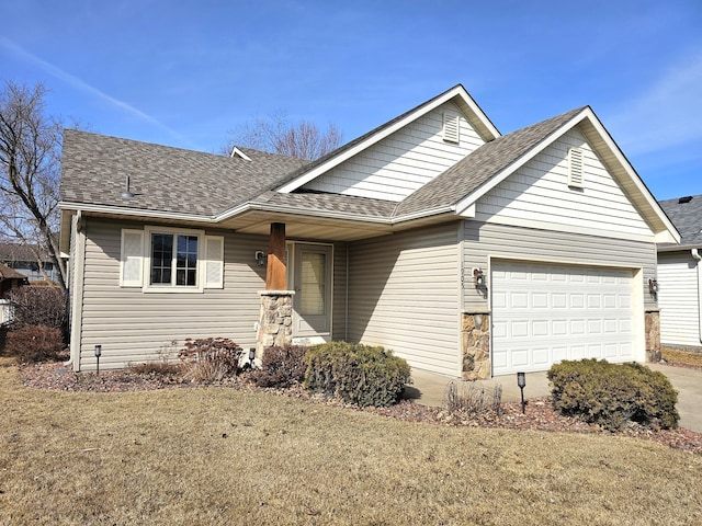 ranch-style home featuring a garage, driveway, and a shingled roof