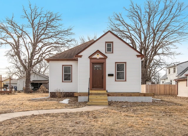 bungalow with a front lawn