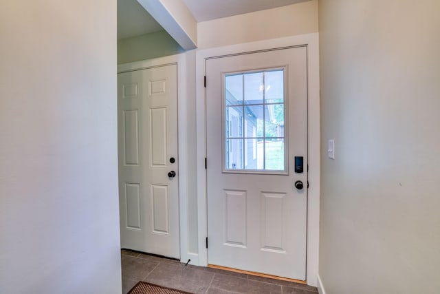 entryway featuring tile patterned flooring