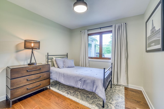 bedroom featuring wood-type flooring