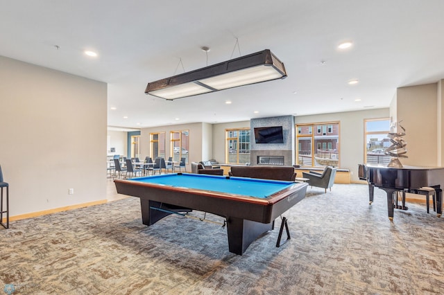 playroom featuring carpet flooring, a large fireplace, and billiards