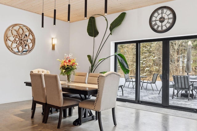 1325 State Highway 27, Ladysmith, WI 54848 - dining space featuring wooden ceiling, concrete floors, and a wealth of natural light