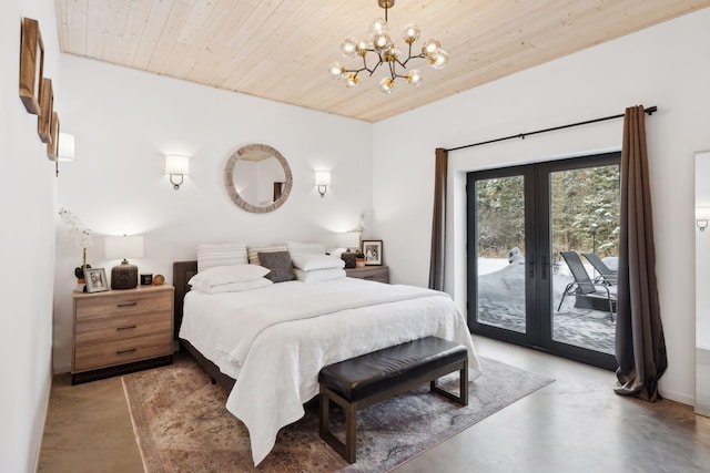 1325 State Highway 27, Ladysmith, WI 54848 - bedroom with finished concrete floors, a chandelier, wood ceiling, french doors, and access to outside