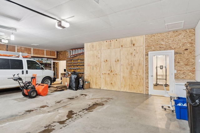1325 State Highway 27, Ladysmith, WI 54848 - garage featuring a garage door opener