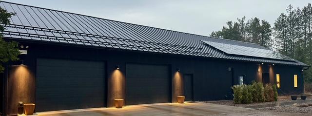 1325 State Highway 27, Ladysmith, WI 54848 - exterior space featuring a garage, a standing seam roof, and metal roof