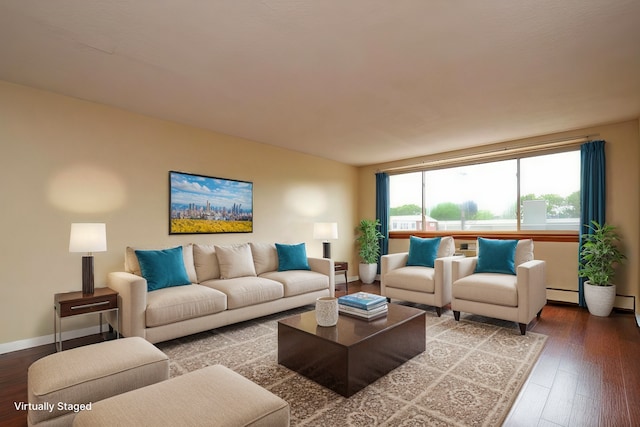 living room with baseboard heating and wood-type flooring