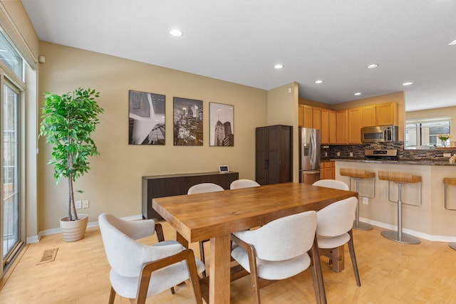 dining area featuring light hardwood / wood-style floors