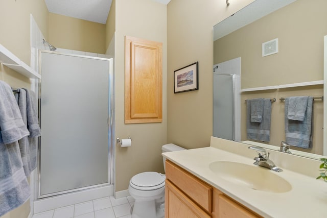 bathroom with vanity, an enclosed shower, tile patterned floors, and toilet