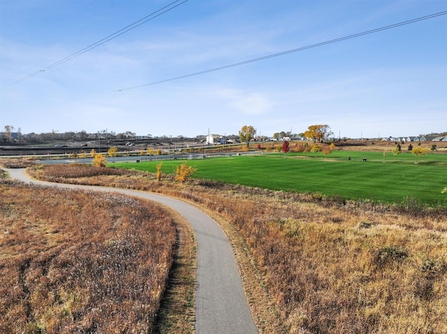 view of home's community featuring a lawn